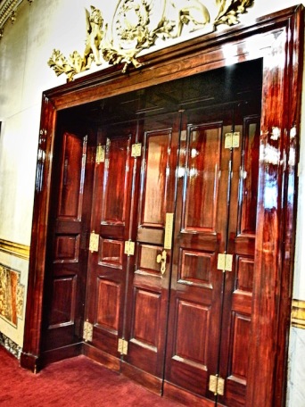 amazing old wood doors to private booth at national theater in san jose costa rica